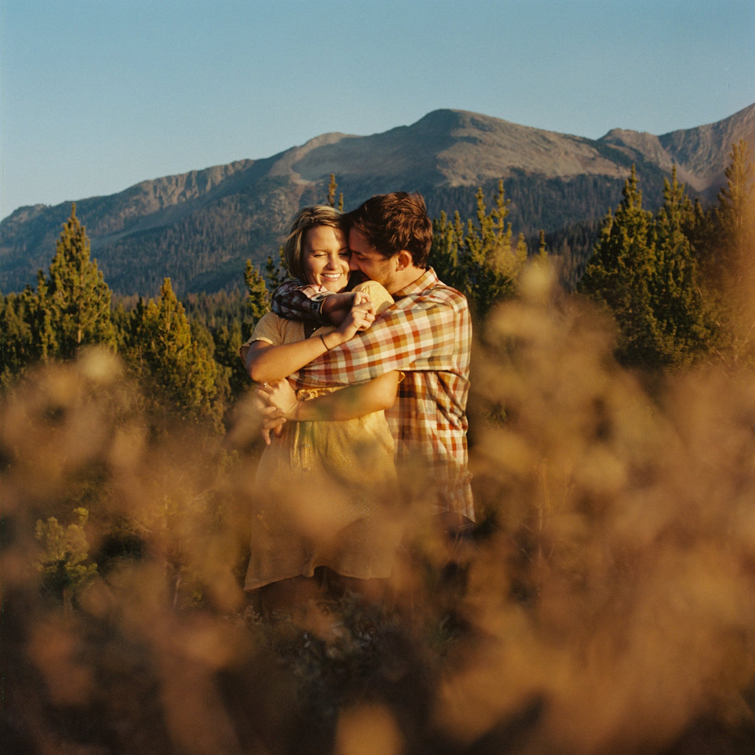 Couple at golden hour in the Colorado mountains